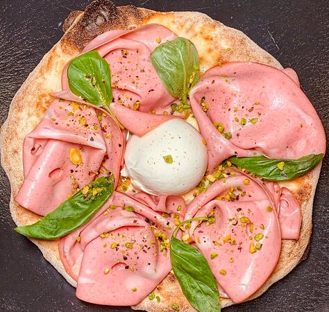 Bella Italia signature dishes Pizza DiavolaSpaghetti CarbonaraLasagna al FornoTiramisù